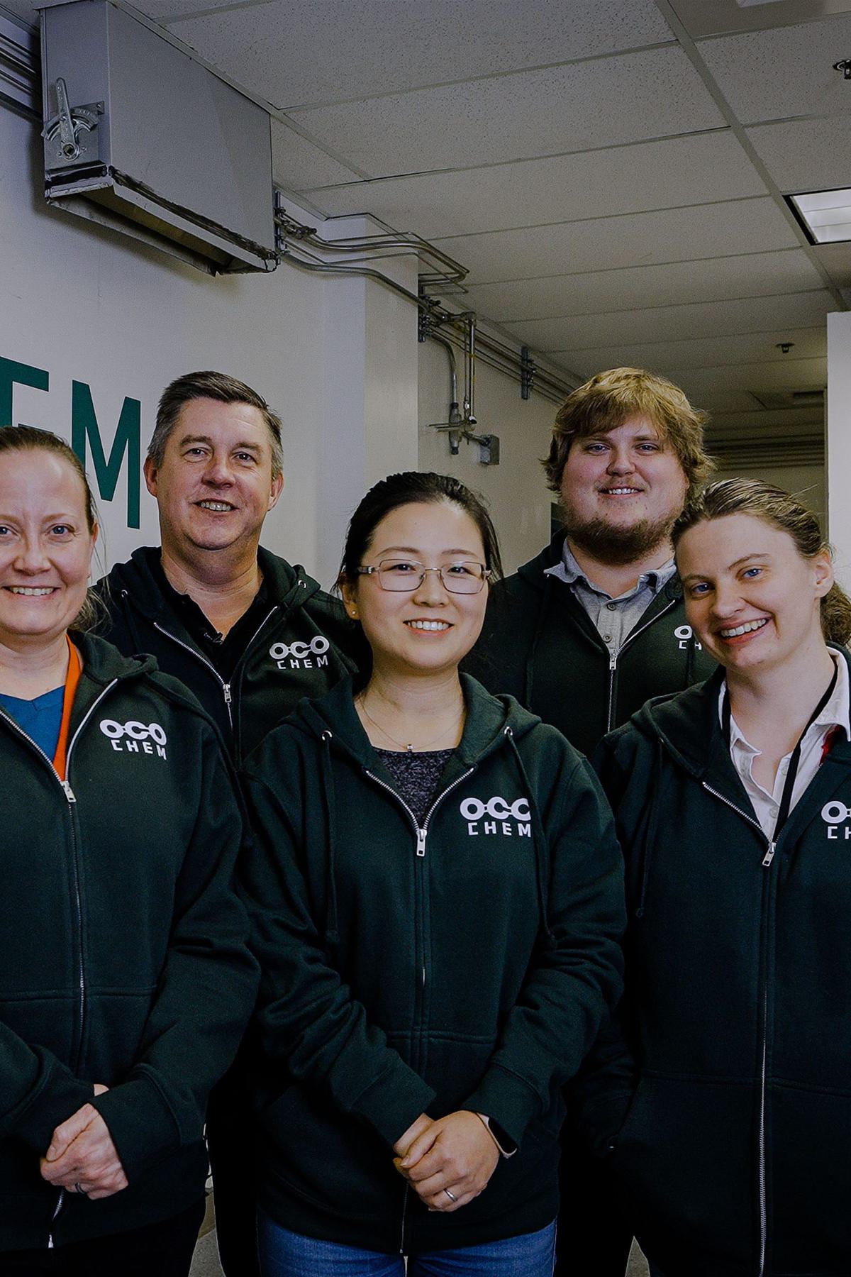 A group of people smiling