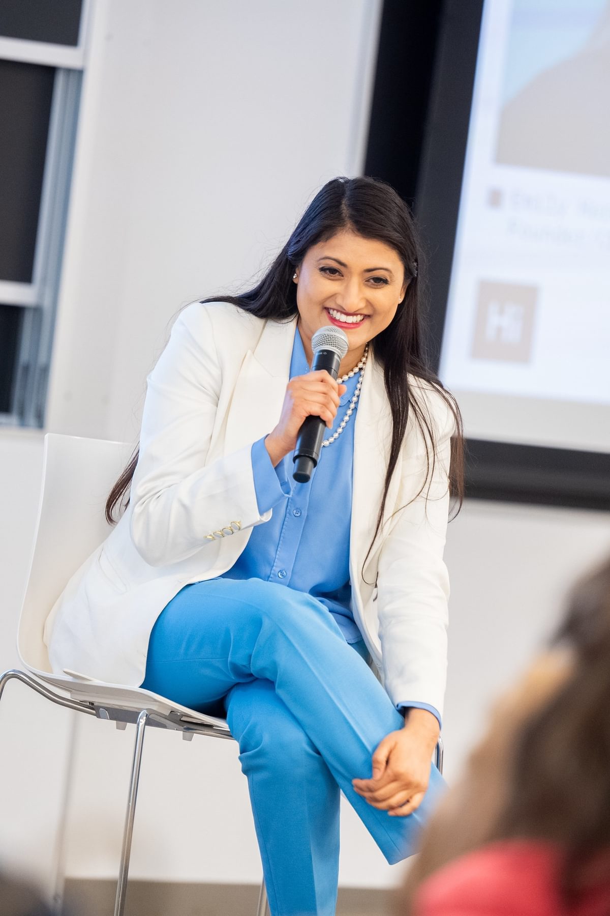 woman holding a microphone
